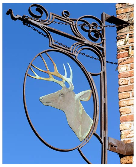 bronze deer head sign